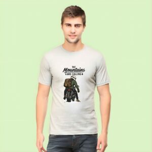 Mountains T-Shirt for Men featuring biker riding into the mountains with “The Mountains Are Calling” quote – 2025 edition